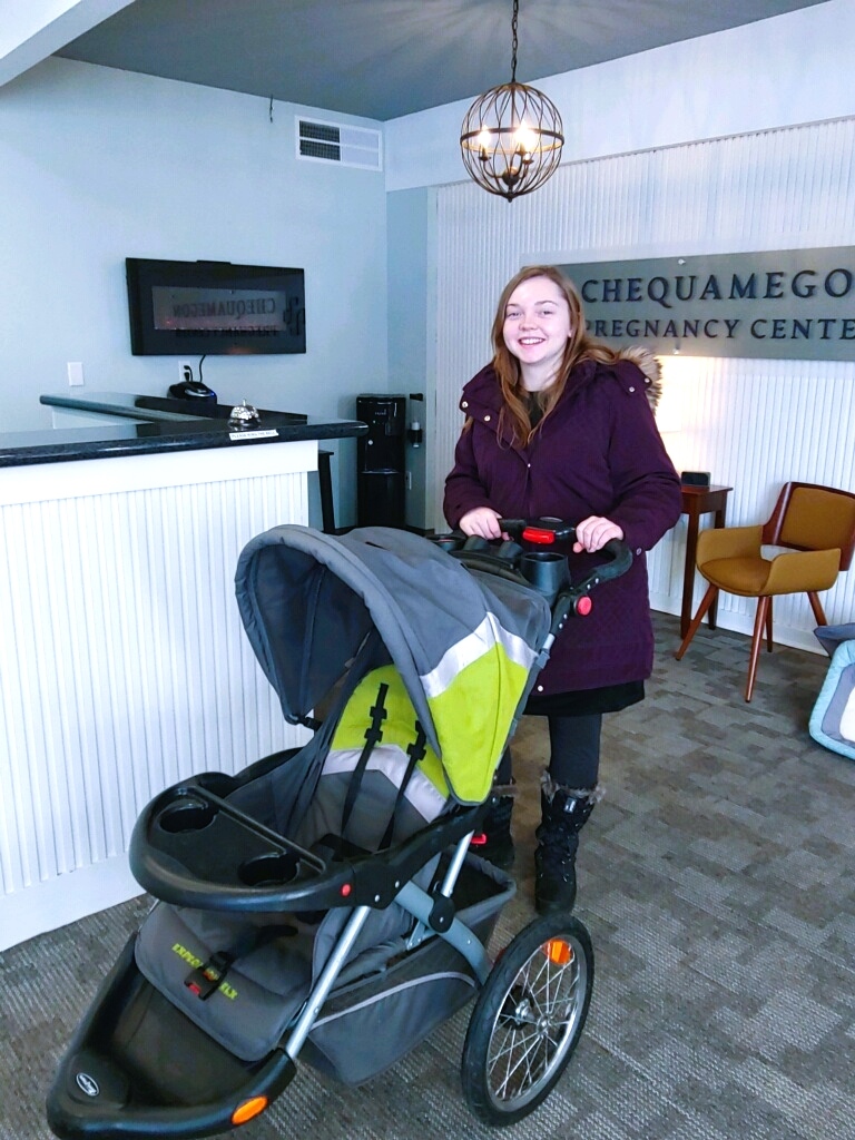 Local woman benefitting from the center with a free stroller